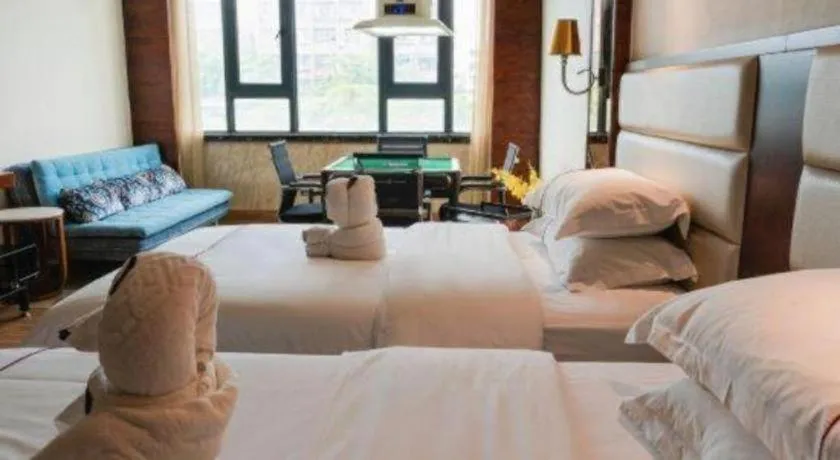 Bed in Haikou Kai Wei Hotel