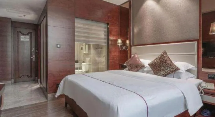 Bed in Haikou Kai Wei Hotel