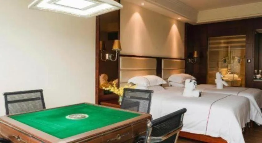 Bed in Haikou Kai Wei Hotel