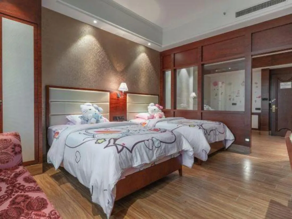 Bed in Haikou Kai Wei Hotel