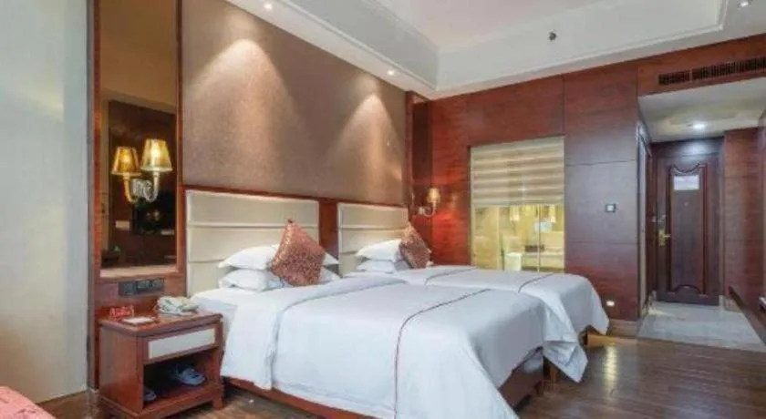 Bed in Haikou Kai Wei Hotel