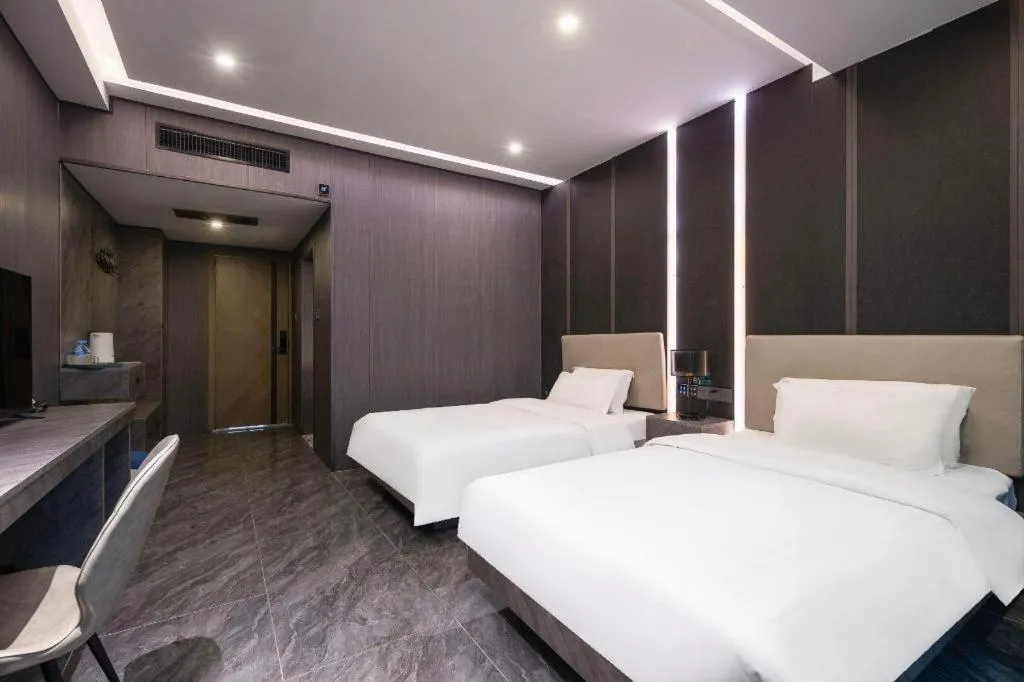 Bed in Haikou Kai Wei Hotel