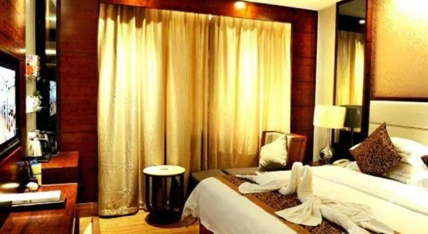 Bed in Haikou Kai Wei Hotel