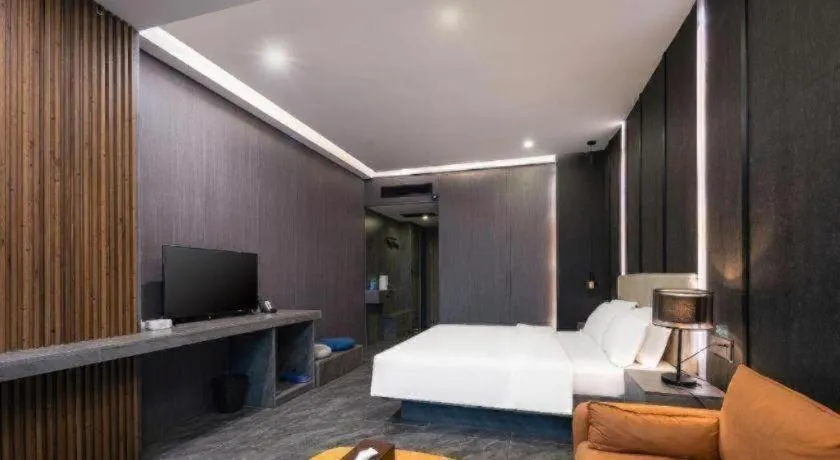 Bed in Haikou Kai Wei Hotel