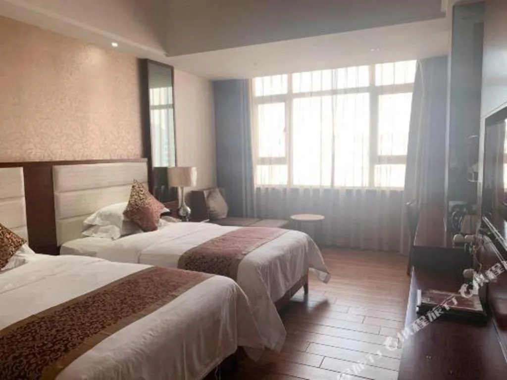 Bed in Haikou Kai Wei Hotel