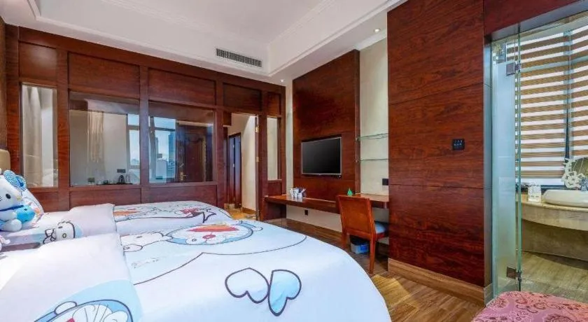 Bed in Haikou Kai Wei Hotel