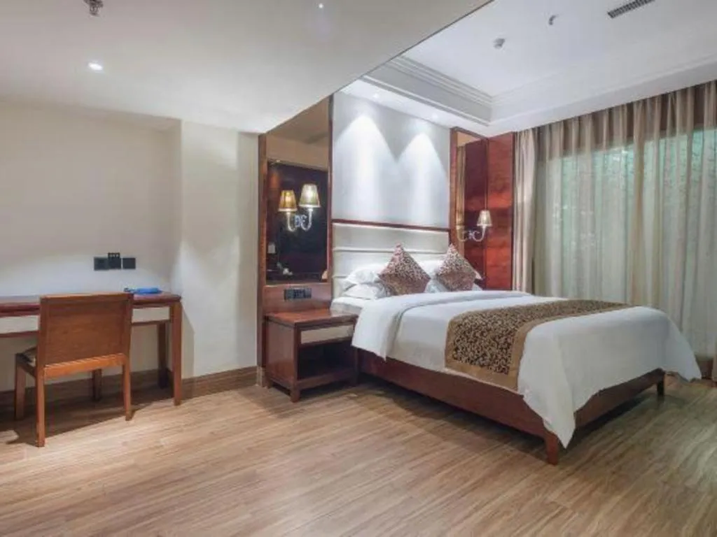 Bed in Haikou Kai Wei Hotel