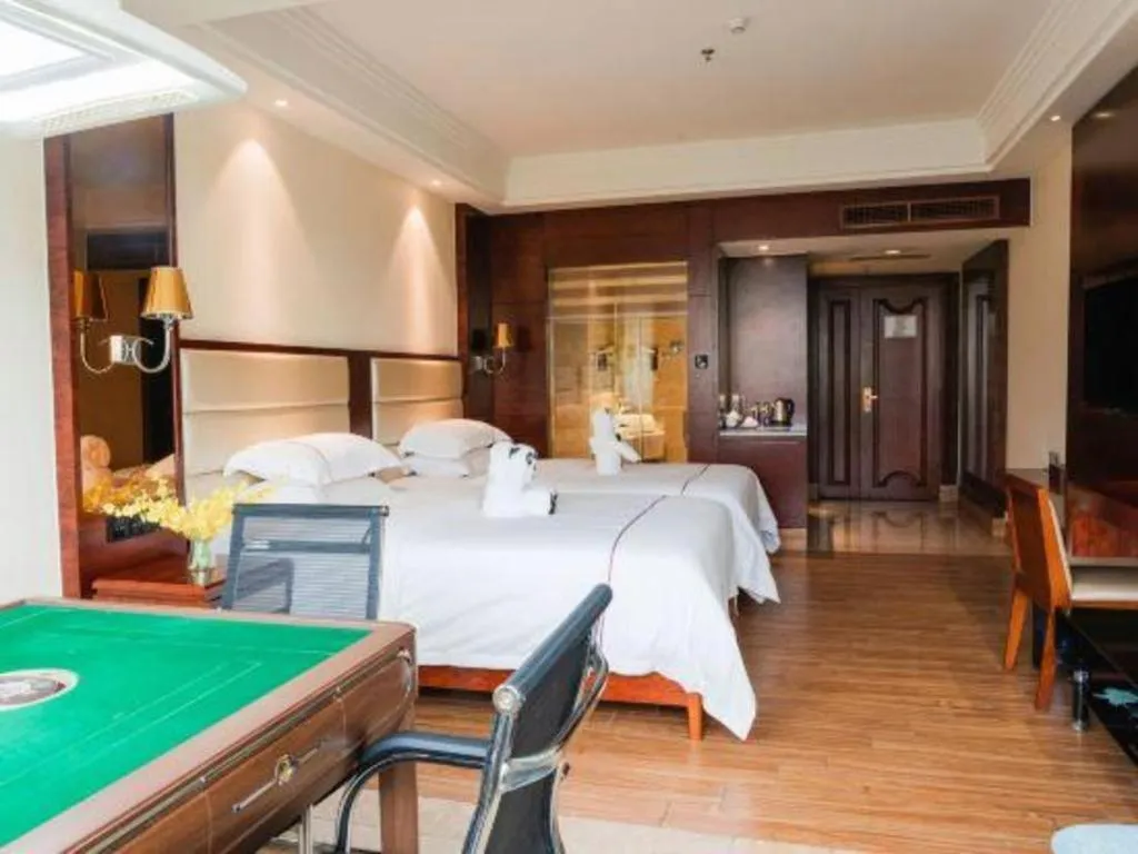 Bed in Haikou Kai Wei Hotel