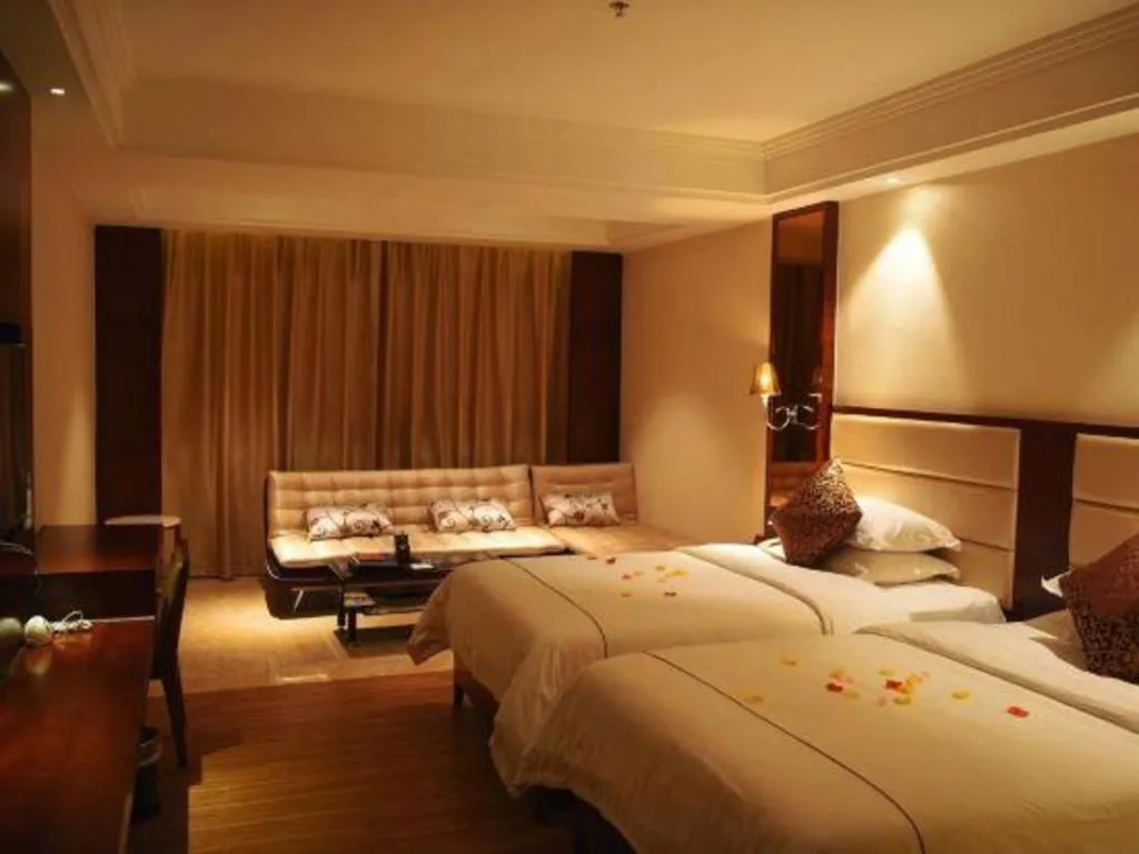 Bed in Haikou Kai Wei Hotel