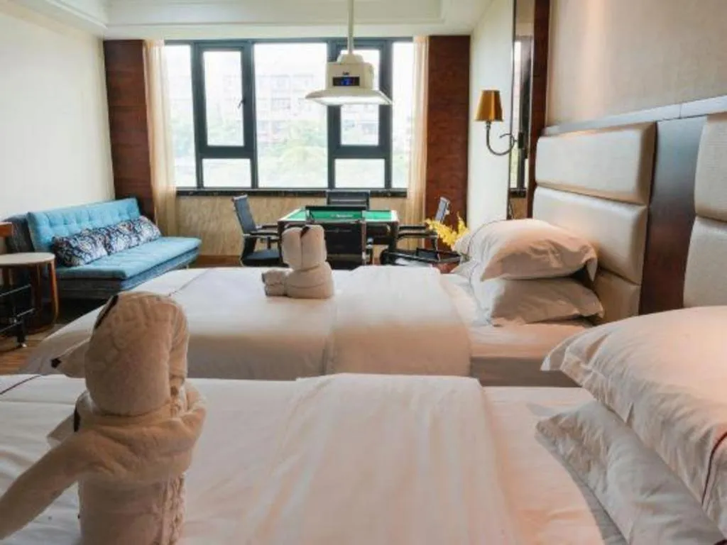 Bed in Haikou Kai Wei Hotel