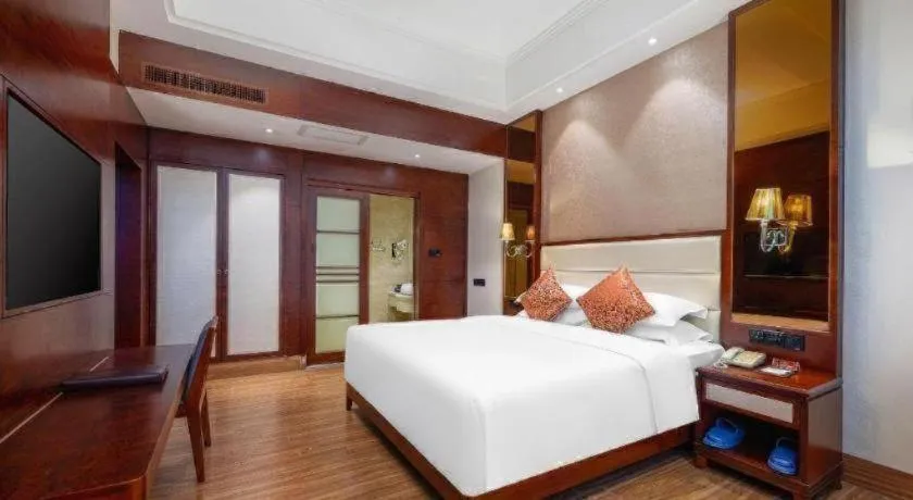 Bed in Haikou Kai Wei Hotel