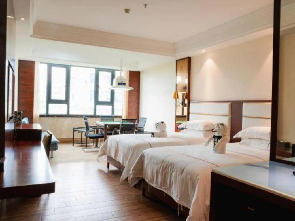 Bed in Haikou Kai Wei Hotel