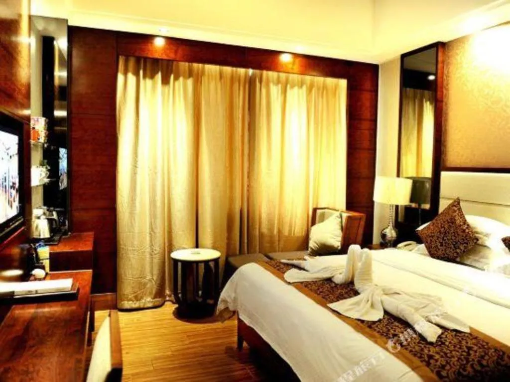 Bed in Haikou Kai Wei Hotel