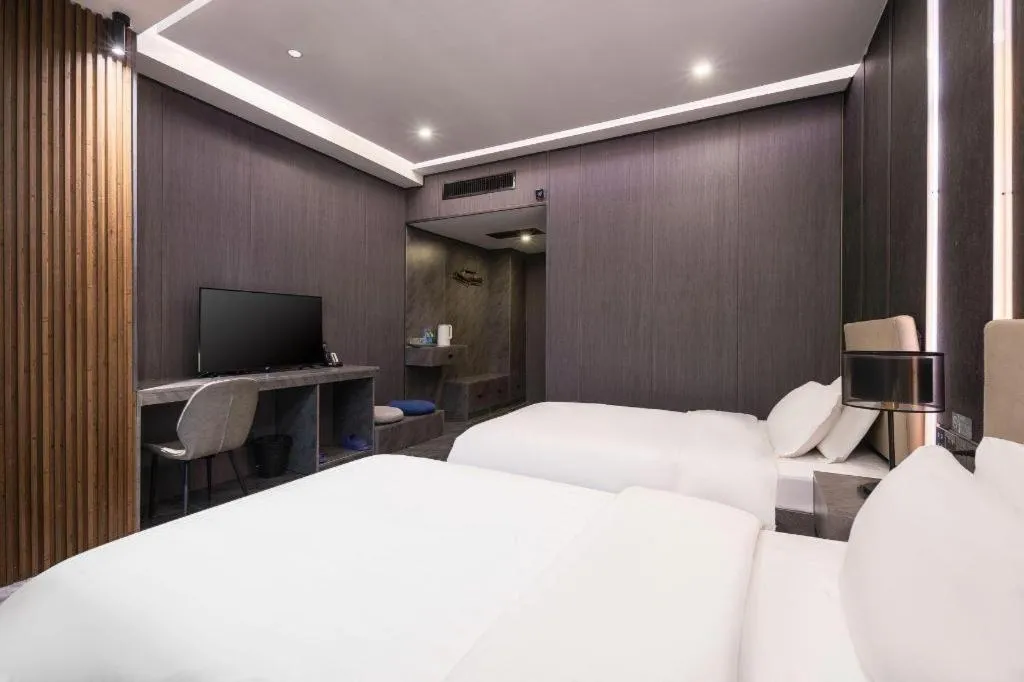 Bed in Haikou Kai Wei Hotel