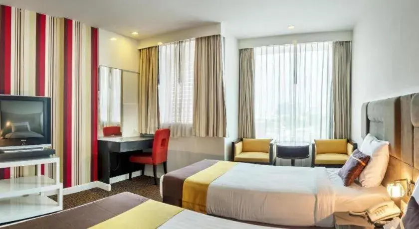 Bed in Thamrongin Hotel Bed in Thamrongin Hotel