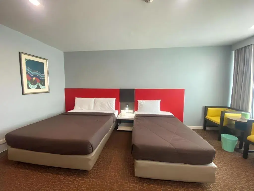 Bed in Thamrongin Hotel Bed in Thamrongin Hotel