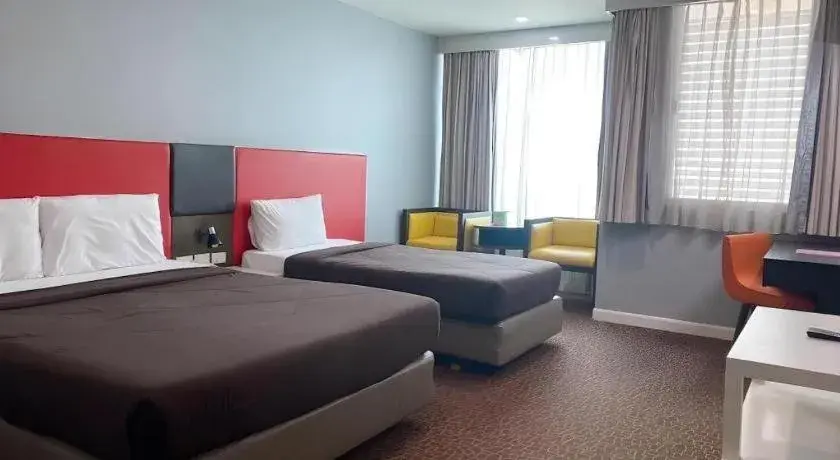 Bed in Thamrongin Hotel Bed in Thamrongin Hotel