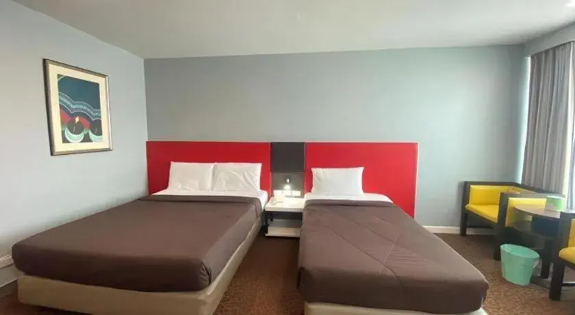 Bed in Thamrongin Hotel Bed in Thamrongin Hotel