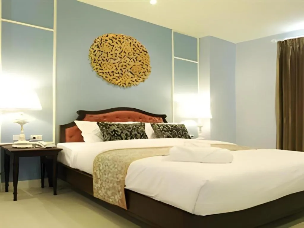 Bed in Khamthana the Colonial Hotel Chiangrai