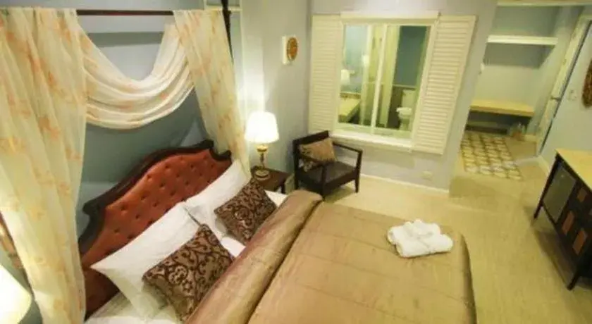 Bed in Khamthana the Colonial Hotel Chiangrai Bed in Khamthana the Colonial Hotel Chiangrai