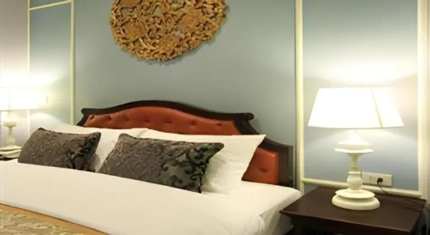 Bed in Khamthana the Colonial Hotel Chiangrai