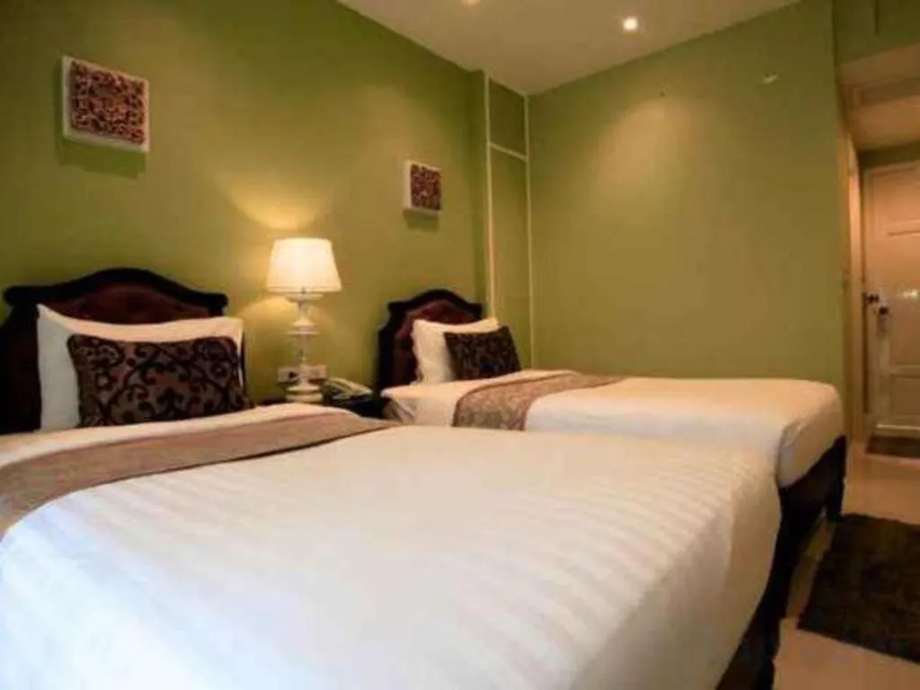 Bed in Khamthana the Colonial Hotel Chiangrai