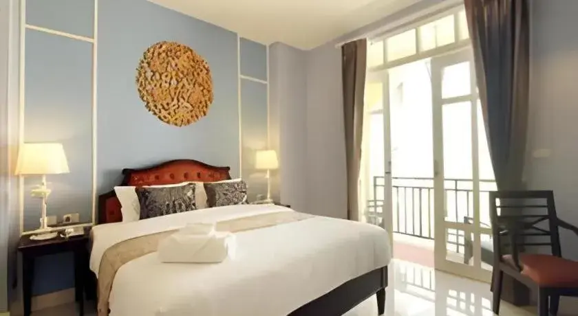 Bed in Khamthana the Colonial Hotel Chiangrai Bed in Khamthana the Colonial Hotel Chiangrai