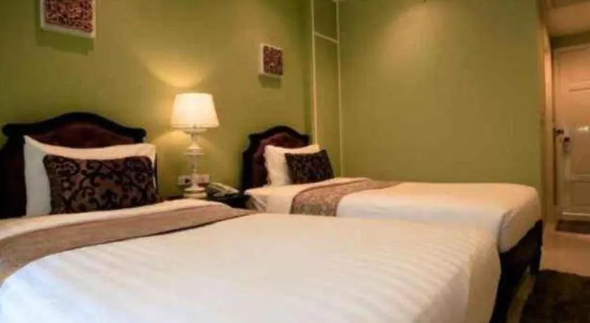 Bed in Khamthana the Colonial Hotel Chiangrai