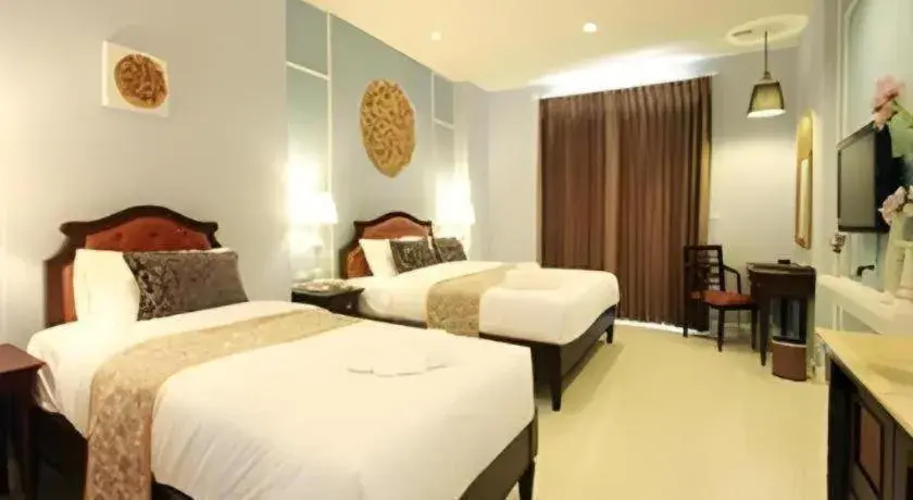 Bed in Khamthana the Colonial Hotel Chiangrai Bed in Khamthana the Colonial Hotel Chiangrai