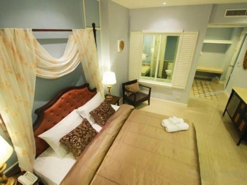 Bed in Khamthana the Colonial Hotel Chiangrai