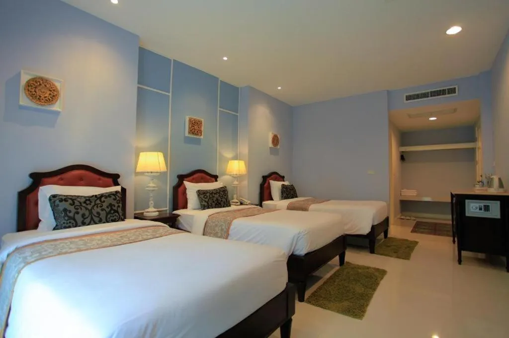 Bed in Khamthana the Colonial Hotel Chiangrai