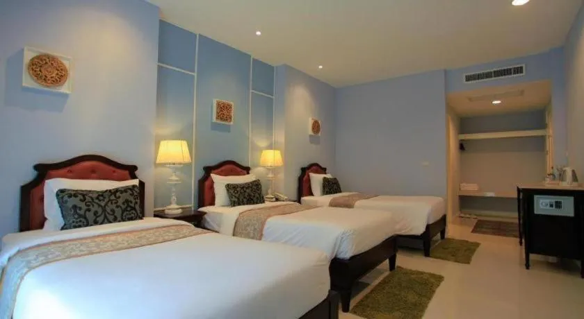 Bed in Khamthana the Colonial Hotel Chiangrai