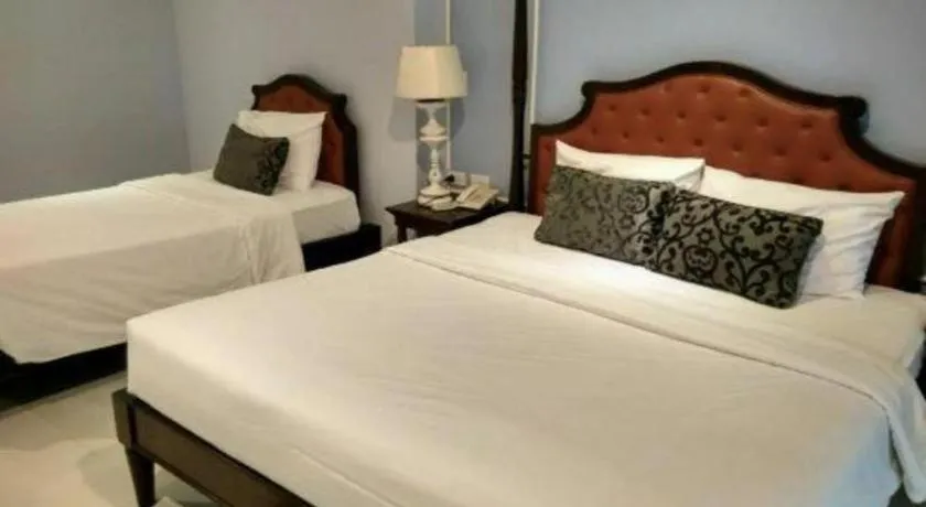 Bed in Khamthana the Colonial Hotel Chiangrai