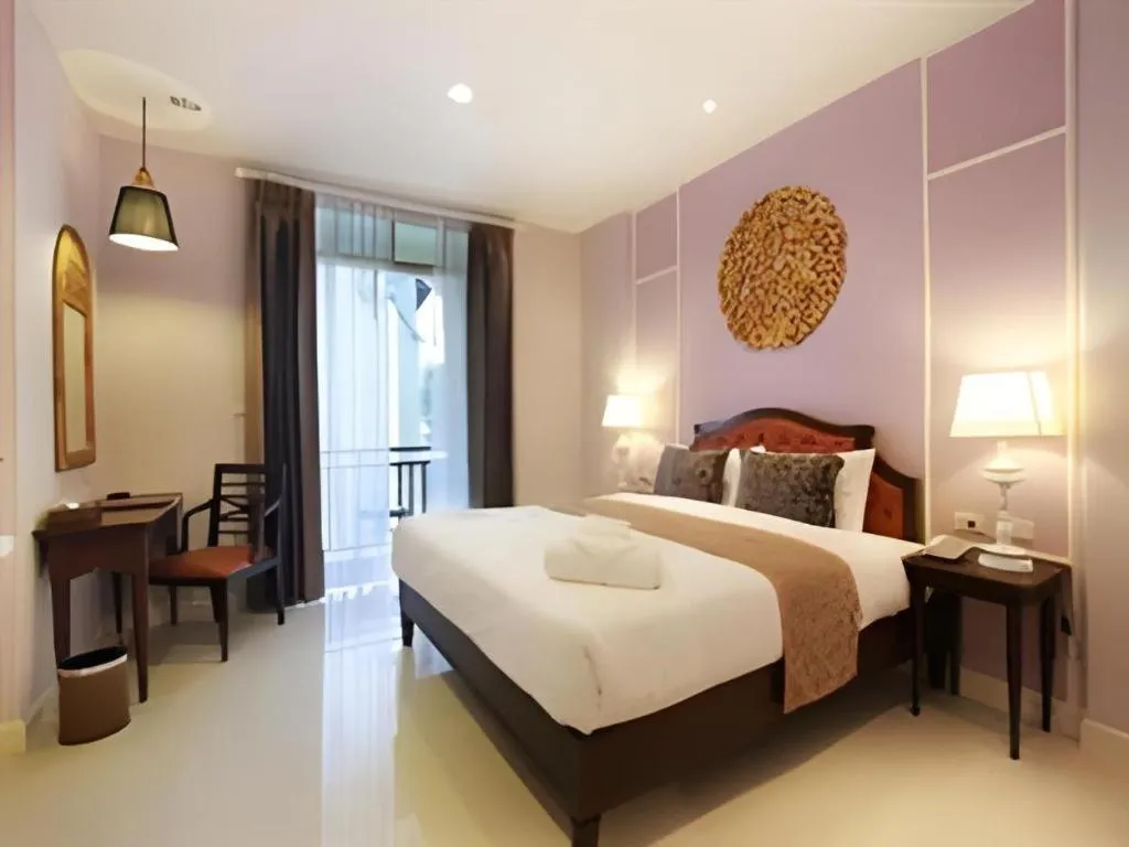 Bed in Khamthana the Colonial Hotel Chiangrai