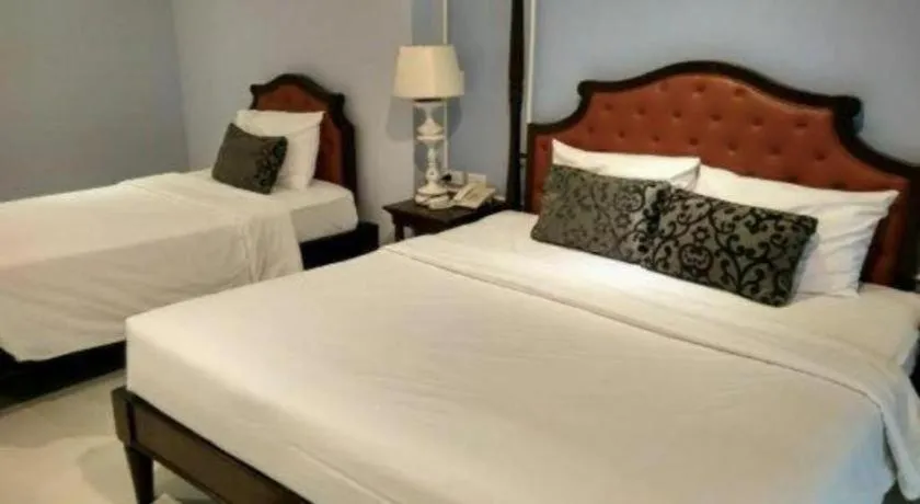 Bed in Khamthana the Colonial Hotel Chiangrai