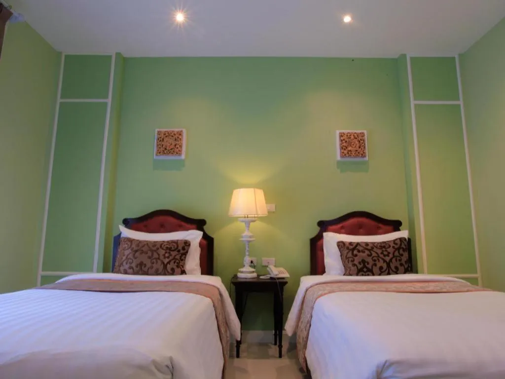 Bed in Khamthana the Colonial Hotel Chiangrai