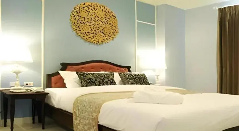 Bed in Khamthana the Colonial Hotel Chiangrai Bed in Khamthana the Colonial Hotel Chiangrai