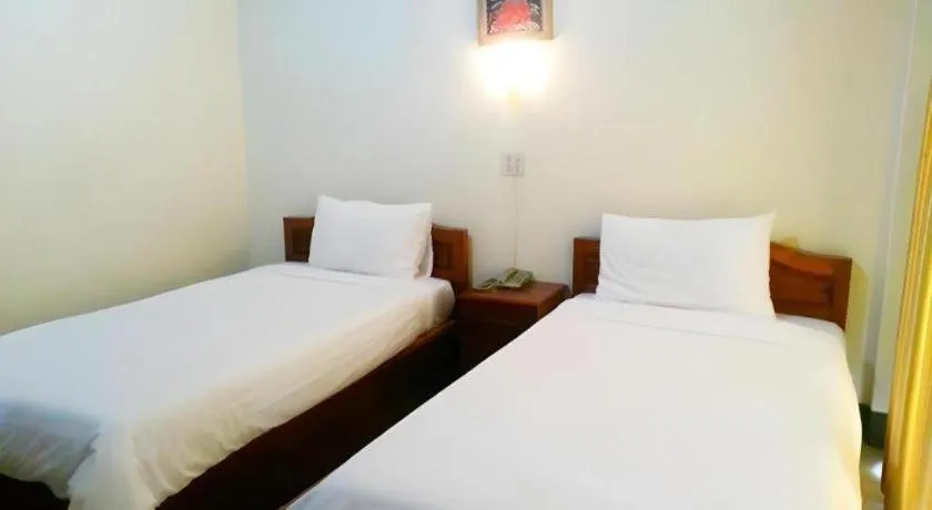 Bed in Sisavath Hotel