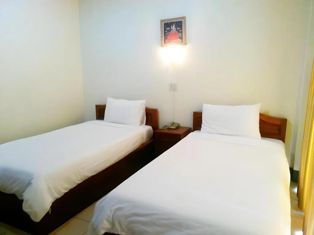 Bed in Sisavath Hotel