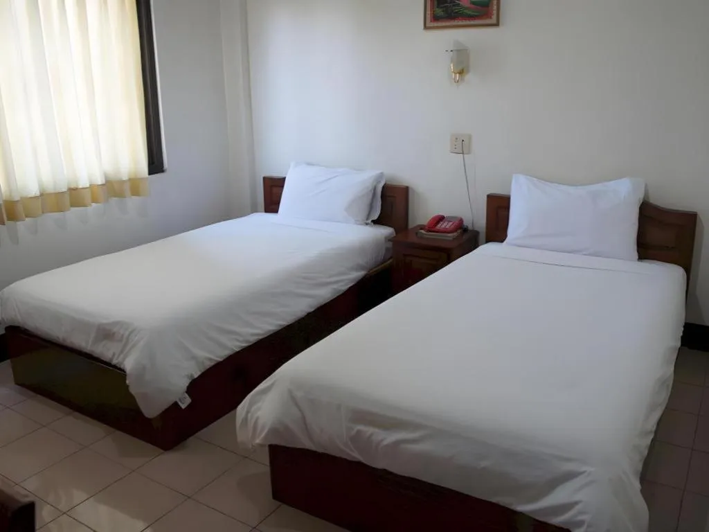 Bed in Sisavath Hotel
