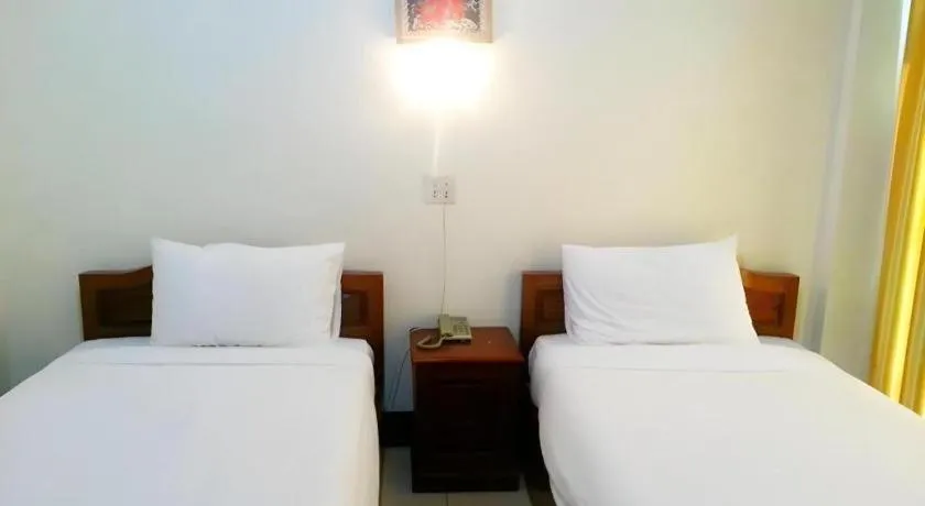 Bed in Sisavath Hotel