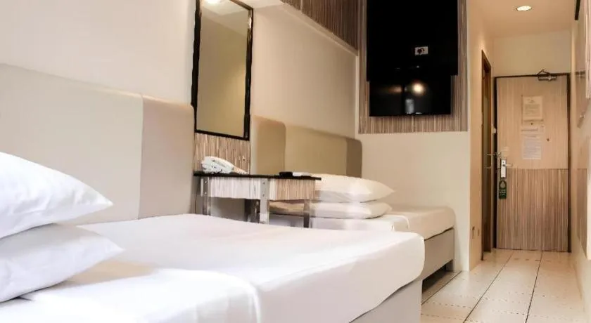 Bed in Majestic Hotel Manila - Formerly Octagon Mansion Hotel Manila