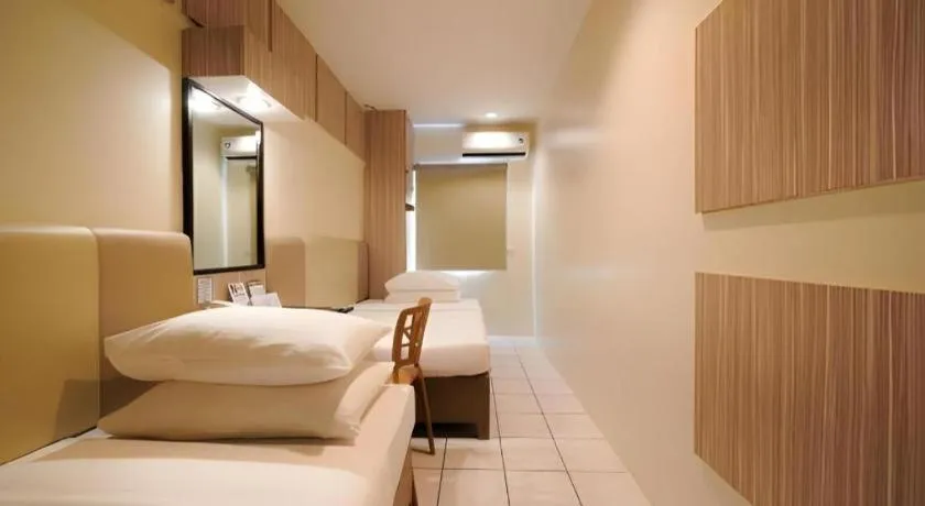 Bed in Majestic Hotel Manila - Formerly Octagon Mansion Hotel Manila