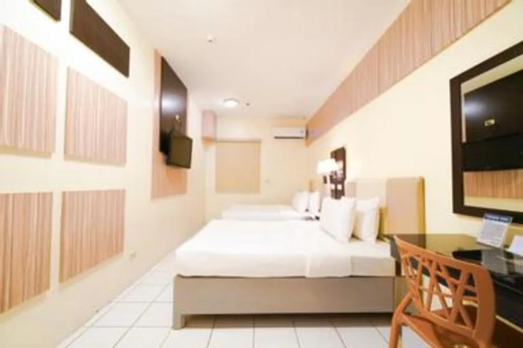 Bed in Majestic Hotel Manila - Formerly Octagon Mansion Hotel Manila