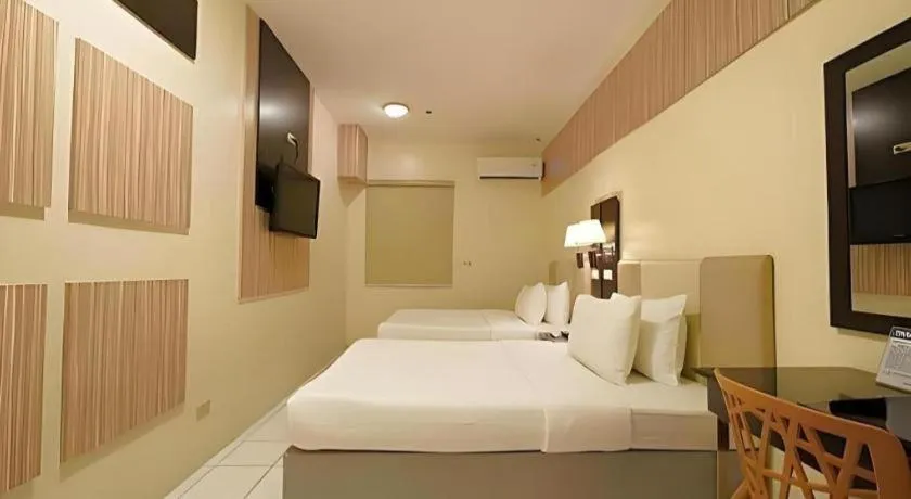 Bed in Majestic Hotel Manila - Formerly Octagon Mansion Hotel Manila