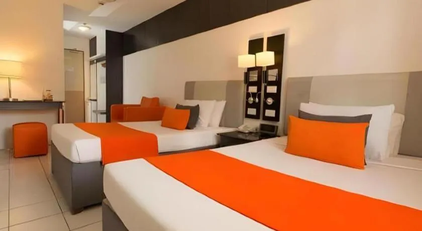 Bed in Majestic Hotel Manila - Formerly Octagon Mansion Hotel Manila