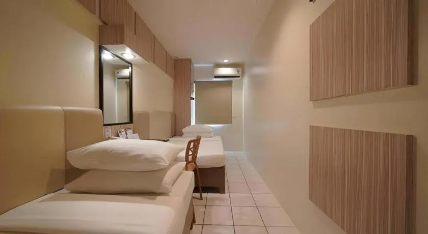 Bed in Majestic Hotel Manila - Formerly Octagon Mansion Hotel Manila