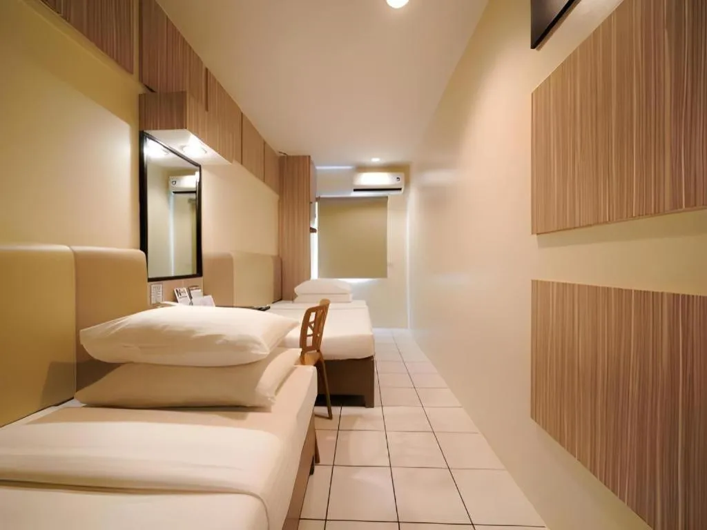 Bed in Majestic Hotel Manila - Formerly Octagon Mansion Hotel Manila