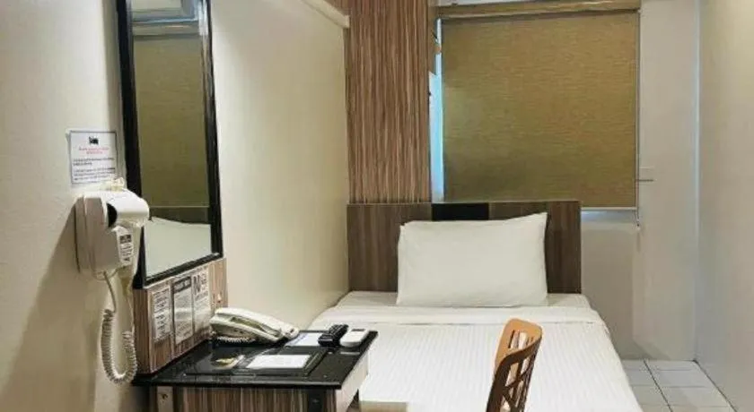 Bed in Majestic Hotel Manila - Formerly Octagon Mansion Hotel Manila