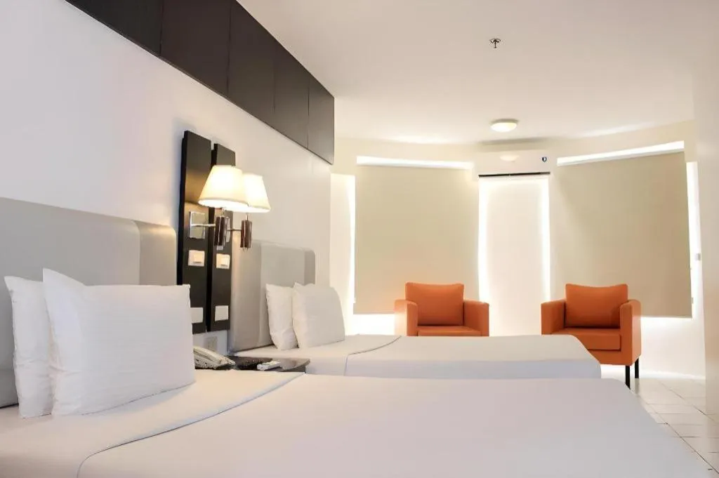 Bed in Majestic Hotel Manila - Formerly Octagon Mansion Hotel Manila